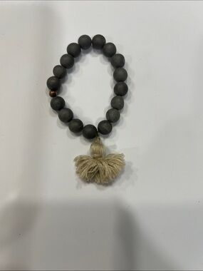 Matte Black Bead Bracelet with Cream Tassel